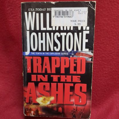 BOOK   TRAPPED IN THE ASHES  BY WILLIAM W JOHNSTONE  (BOX41)