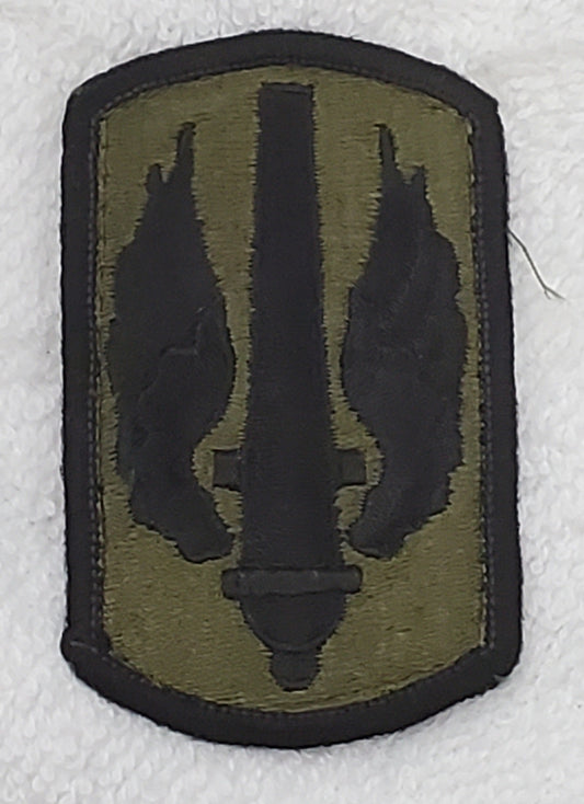 US Army 18th Field Artillery Brigade Subdued Sew On Patch OD BLACK (bu9-18fa)